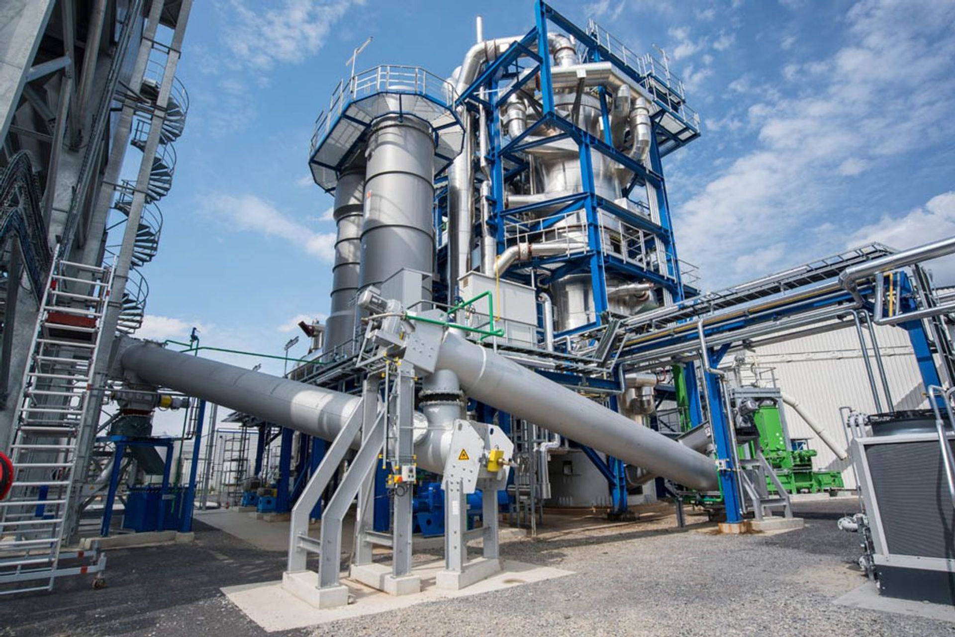 Industrial plant for biofuel production illustrating conversion of waste into sustainable energy