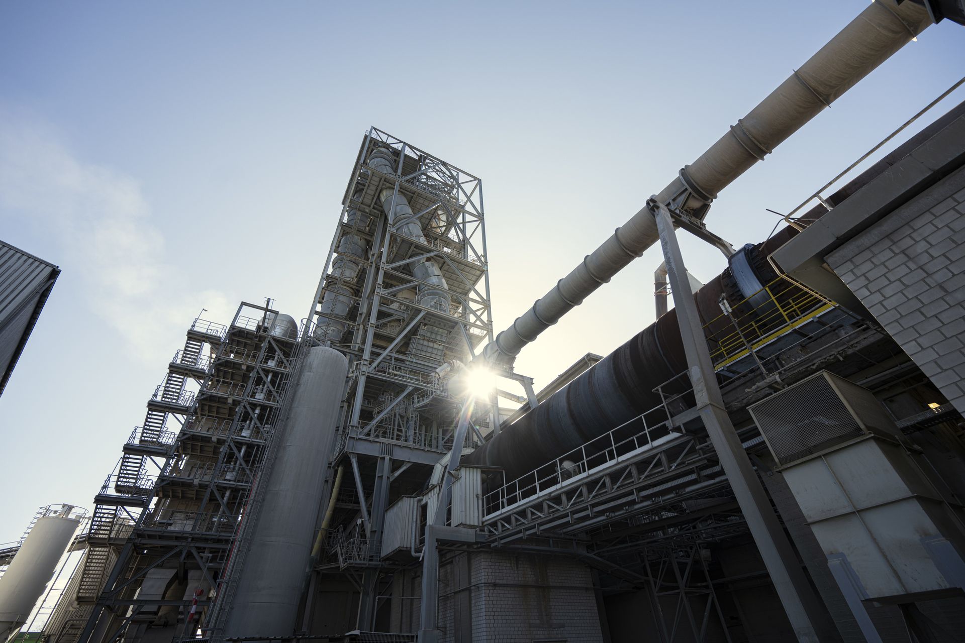 A view of a CO₂ capture plant using thyssenkrupp Calvion's pure oxyfuel technology in a cement production environment at a cement plant.