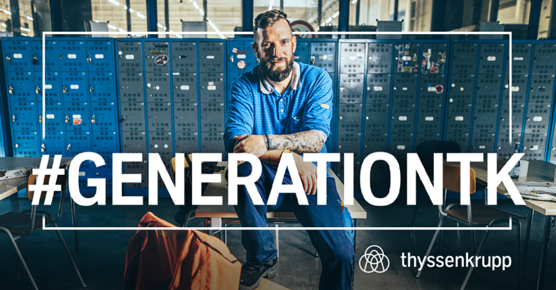 male read person with thyssenkrupp work shirt, short hair, friendly smile, with campaign #GENERATIONTK