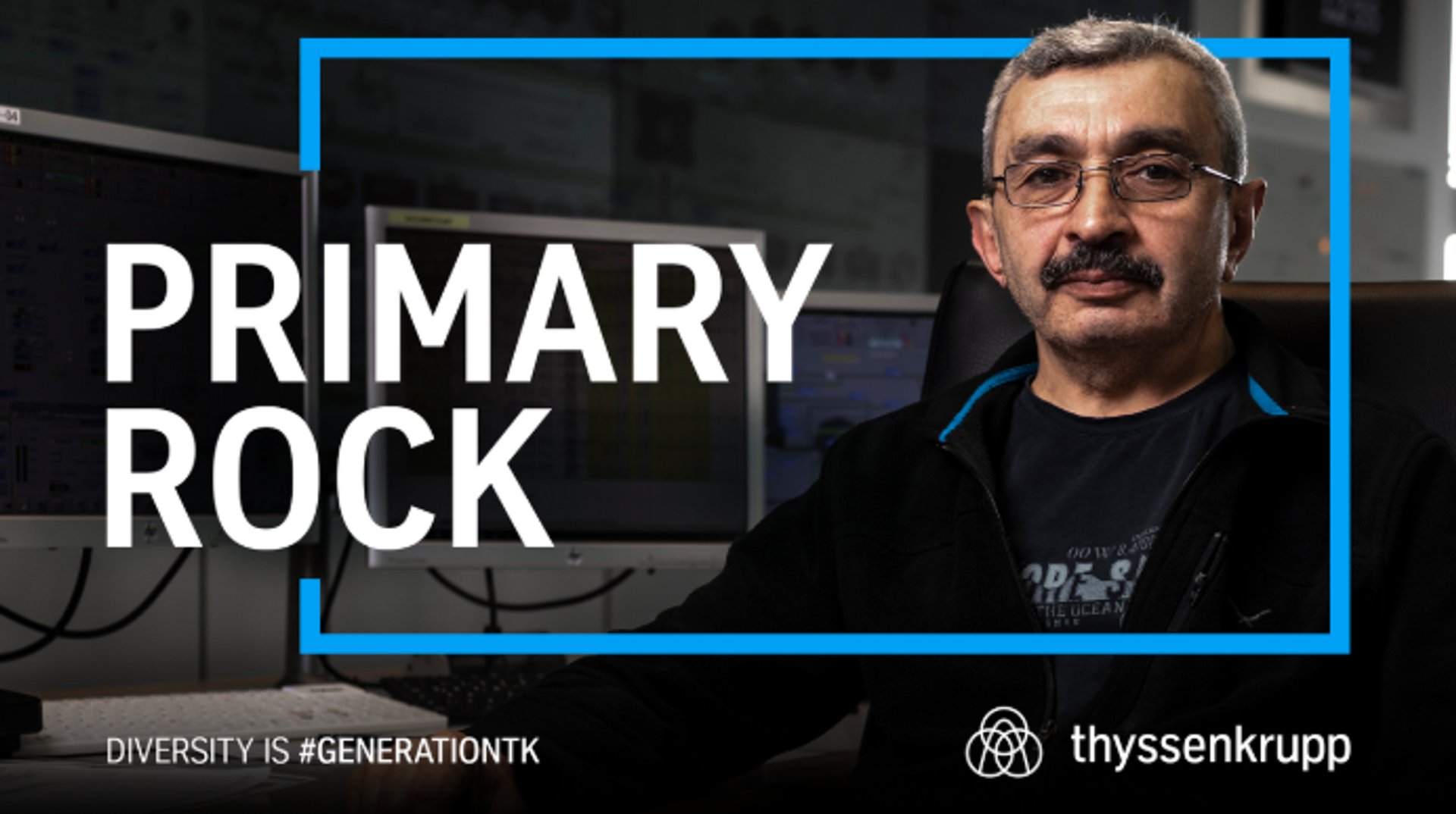 Man with moustache and glasses, "PRIMARY ROCK" lettering in the foreground