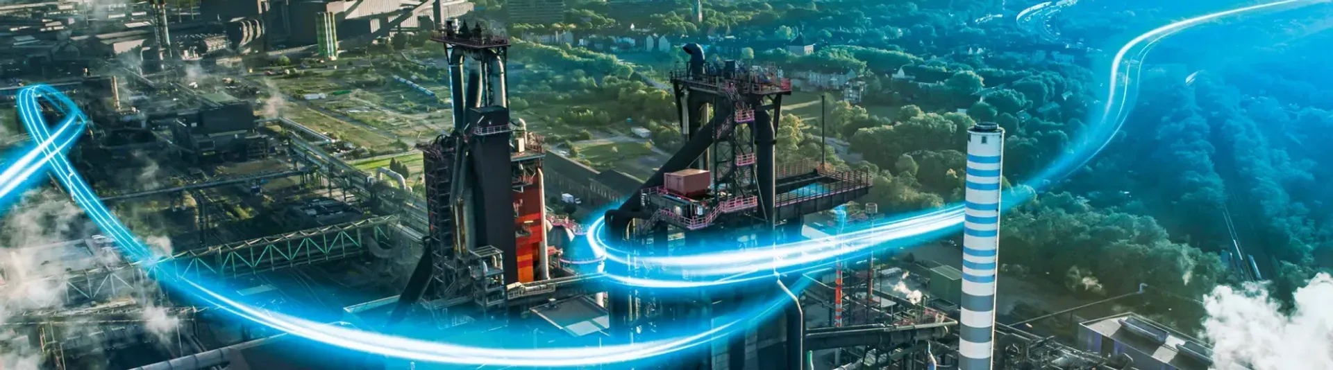 Industrial plant with digital energy flow visualization showing climate-friendly technologies and smart infrastructure