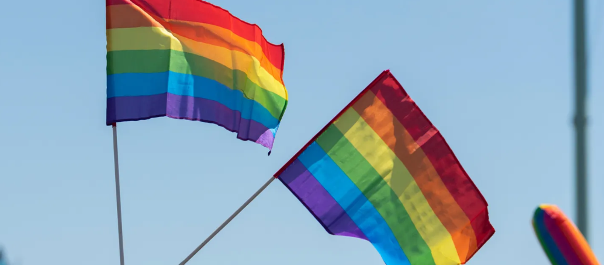 two rainbow flags