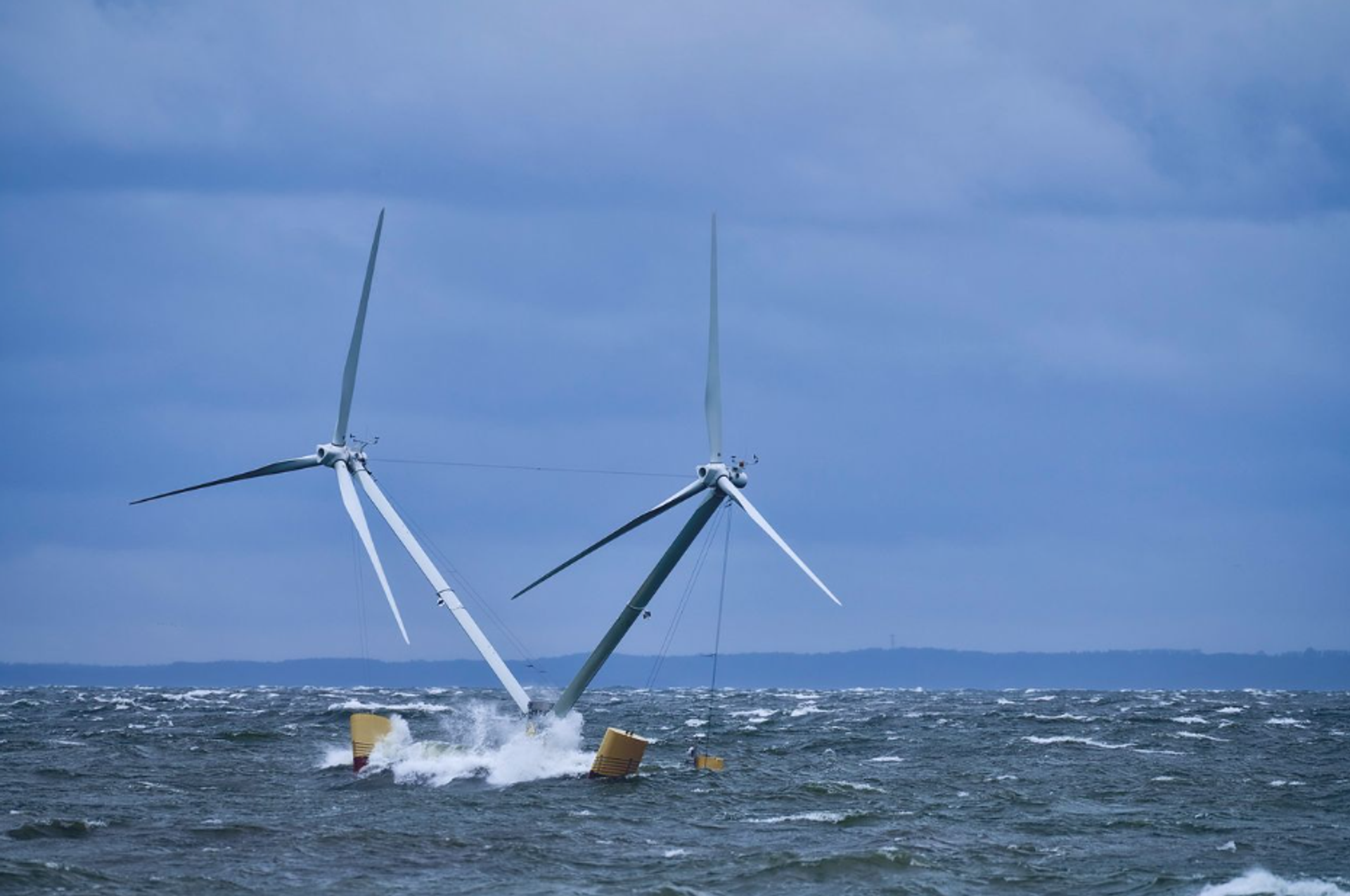 Floating wind turbine on the high seas generates renewable energy under harsh offshore conditions.