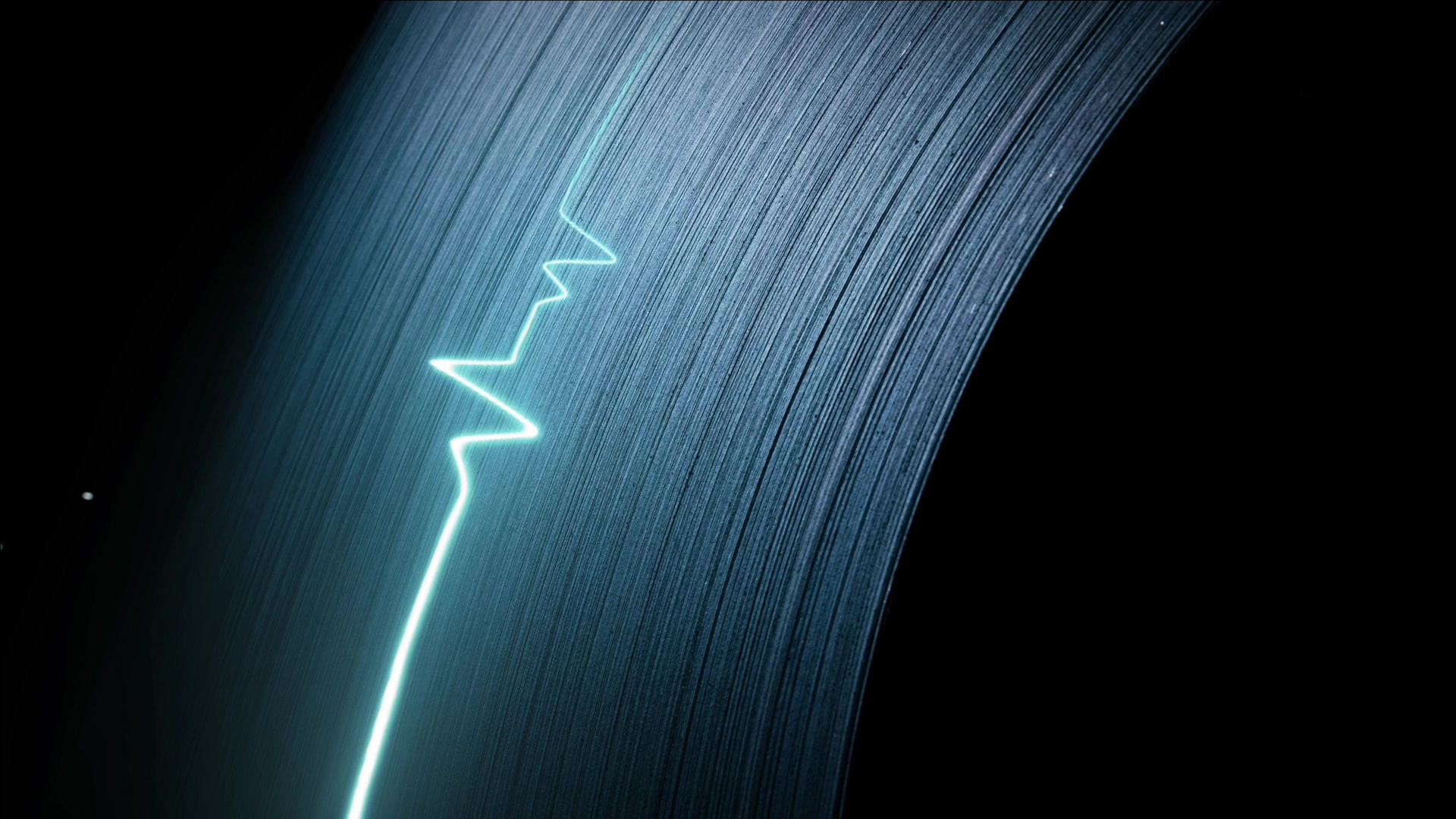 Close-up of the layered edge of a coil of powercore® electrical steel from thyssenkrupp Steel with a graphic visualization of electrical energy.