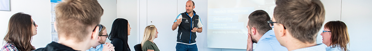 Employee gives a presentation to colleagues