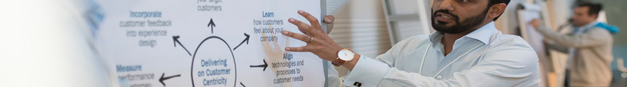 Employee presenting on a flipchart