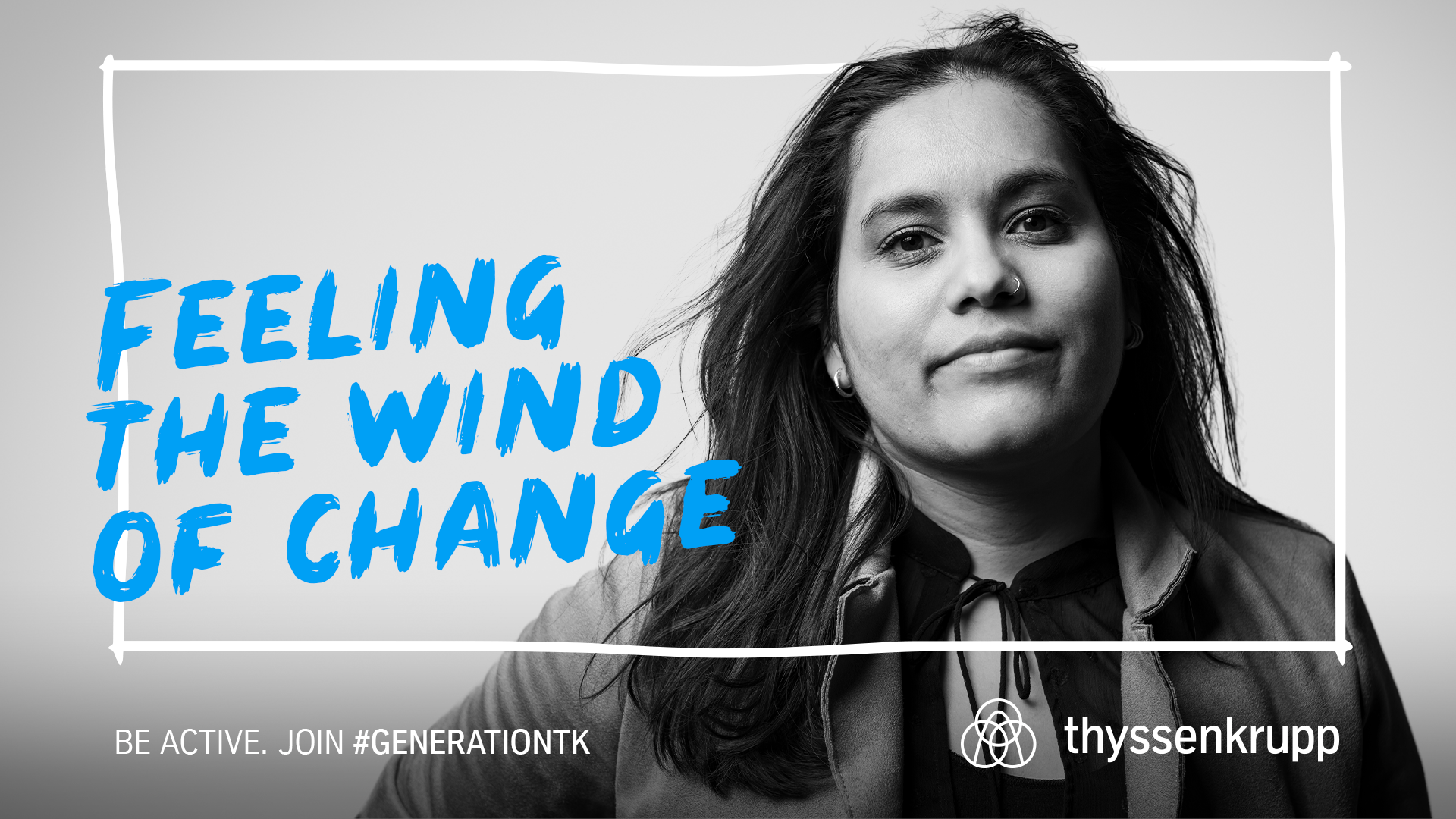 Black and white photo of a young woman with dark long hair, with the inscription: I make wind.