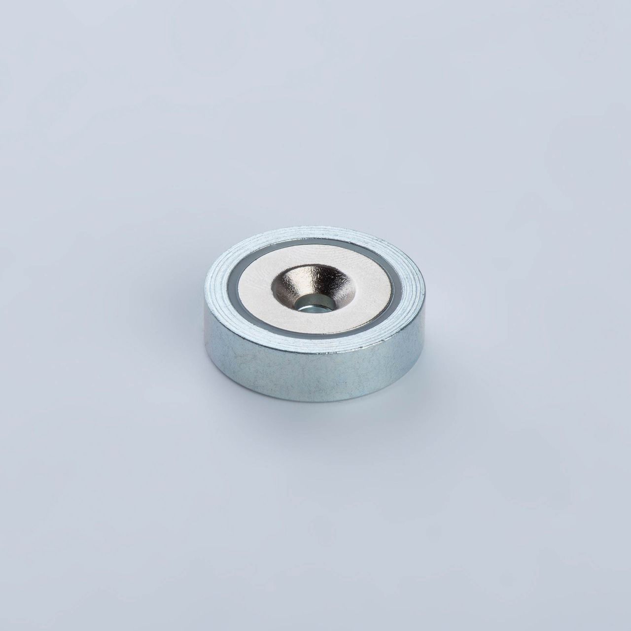 Pot magnet made of Neodym, with bore and counterbore, galvanized, thyssenkrupp Magnettechnik